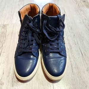 Royal blue Steven Madden side zip kicks.